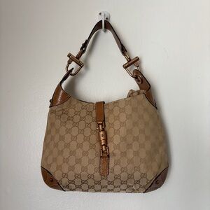 Authentic Gucci Shoulder Bag 
GG Canvas Nailhead Jackie Hobo